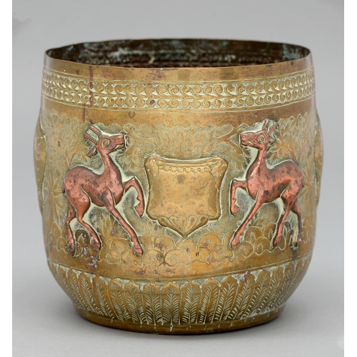 593 - An Indian engraved brass cache pot, 19th / 20th c, applied with applied and stamped decoration of de... 