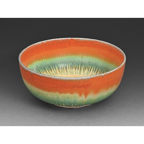 10 - A Shelley Harmony ware fruit bowl, 1930s, in veined and streaked orange, green and amber, 21cm diam,... 