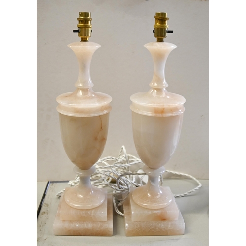 1034 - A pair of turned alabaster table lamps, 45cm h excluding fitment