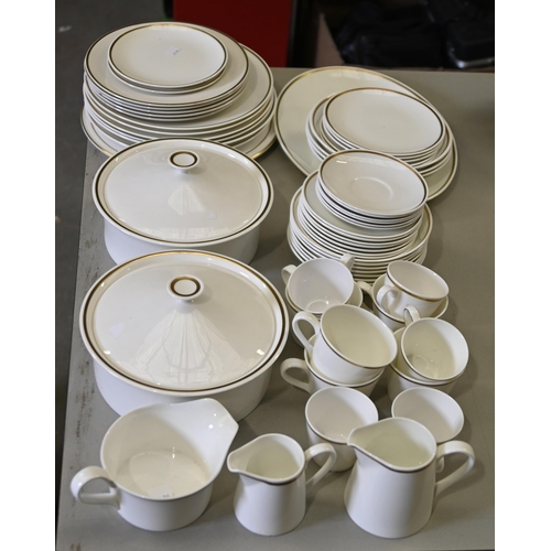 1037 - A Royal Tuscan bone china Sovereign pattern dinner service, including serving plates, a pair of ture... 