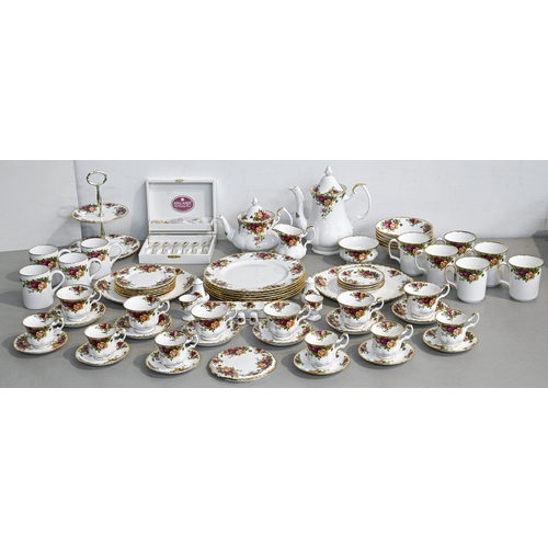 110 - A Royal Doulton earthenware English Rose pattern dinner service, printed mark