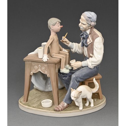 114 - A Lladro group of Geppetto and Pinocchio, 23.5cm h, printed mark