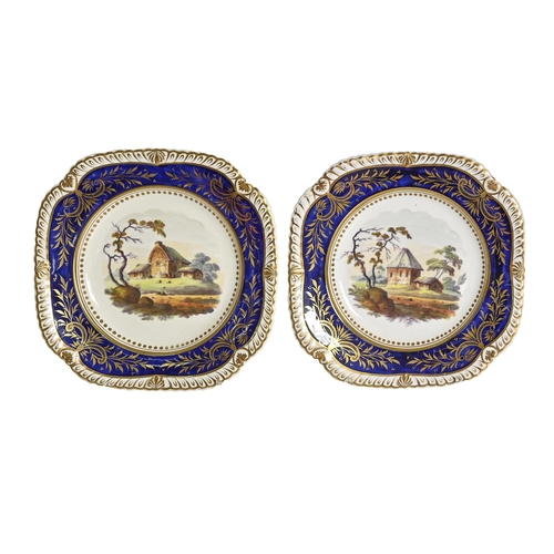 291 - A pair of Charles Bourne dessert plates, c.1825, pattern number 522, painted with landscapes, with g... 