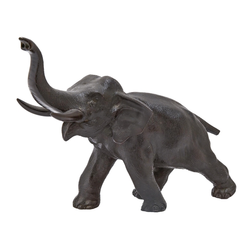 399 - A Japanese bronze sculpture of an elephant, Meiji period, even dark brown patina, 20cm h... 