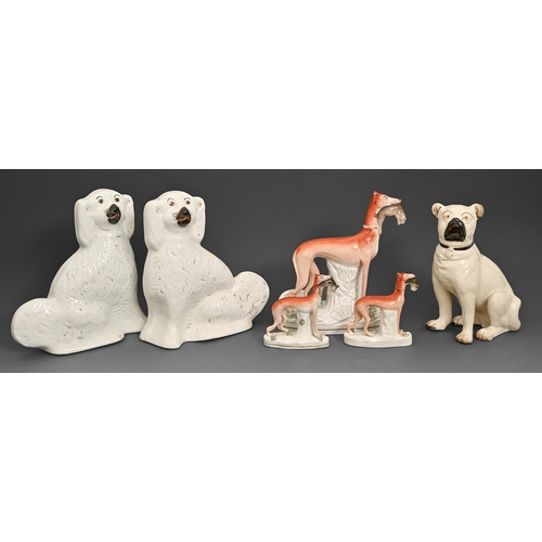 44 - Miscellaneous Staffordshire dogs, first half of 19th c and later, comprising a pug, greyhound, pair ... 