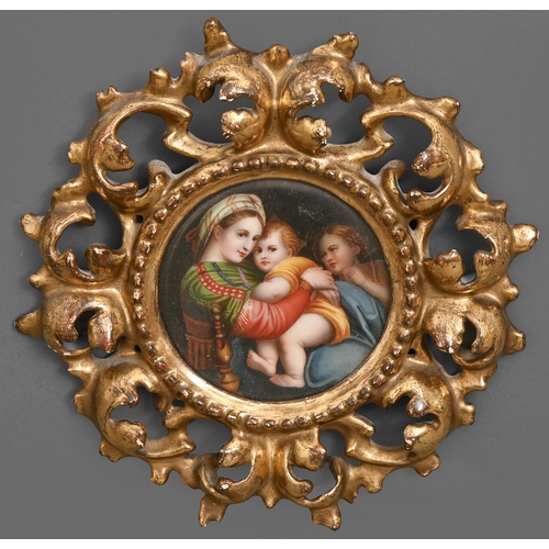 51 - A porcelain plaque, mid 19th c, painted on porcelain after Raphael in a Florentine frame, 20.5cm dia... 