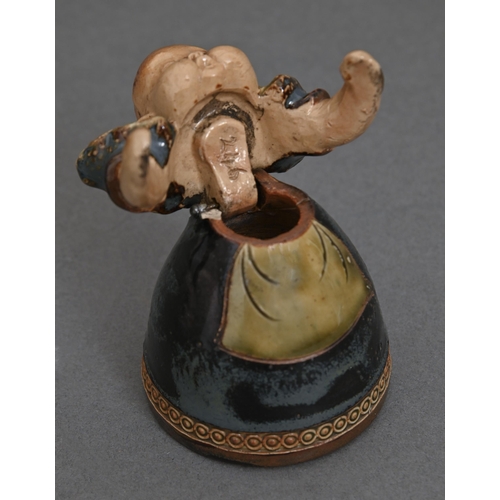 53 - A Doulton Lambeth ware satirical baby figural inkwell, c1908, 85mm h, impressed marks inside initial... 