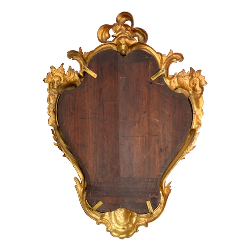 800 - A gilt lacquered brass rococo revival mirror late 19c, with bevelled plate, 73 x 53cm... 