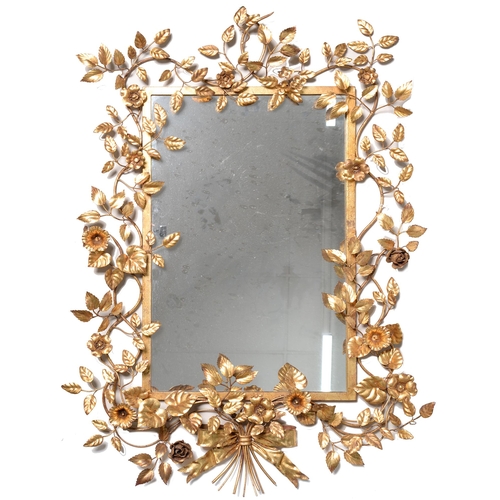 801 - A gilt wire work framed mirror, decorated with a bouquet of flowers and foliage, 125 x 77cm... 