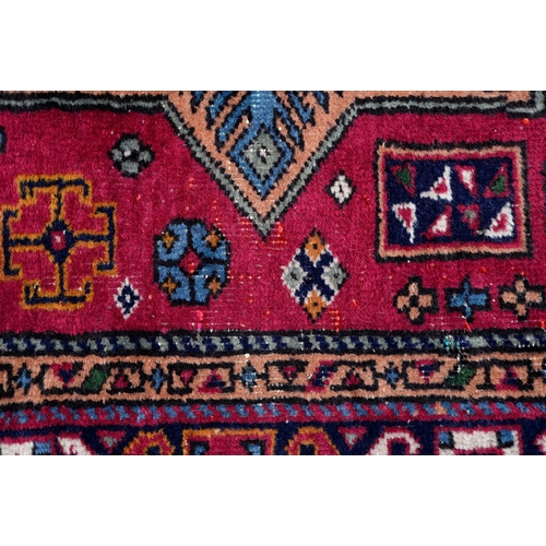 811 - A Turkish tribal bird rug, early 20th c, 189 x 130cm