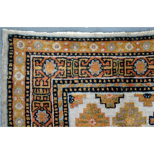 825 - A trans caucasian Armenian rug, mid 20th c, 150 x 92cm