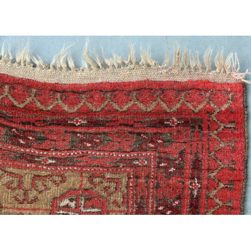 828 - A Kurdish rug, 206cm x 122cm, an Afghan rug, 144cm x 100cm and an Afghan prayer rug, 115cm x 76cm (3... 