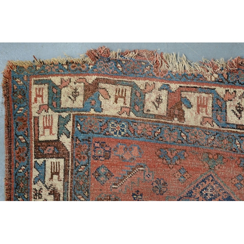 828 - A Kurdish rug, 206cm x 122cm, an Afghan rug, 144cm x 100cm and an Afghan prayer rug, 115cm x 76cm (3... 