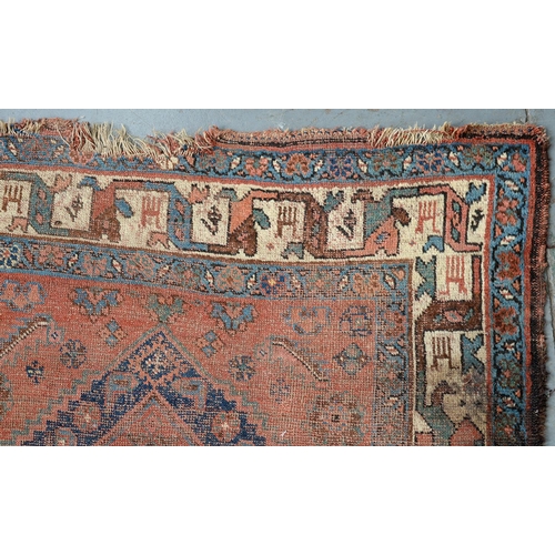 828 - A Kurdish rug, 206cm x 122cm, an Afghan rug, 144cm x 100cm and an Afghan prayer rug, 115cm x 76cm (3... 