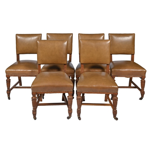 830 - A set of six Victorian oak dining chairs, with brass nailed and padded leather back and seat, 93cm h... 