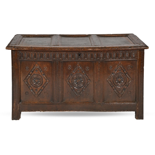 841 - A carved and panelled oak blanket chest, 18th c, 71cm h; 142 x 52cm