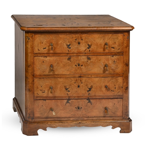 842 - A German walnut chest of drawers, mid 19th c, with quarter veneered top, 76cm h; 45 x 79cm... 