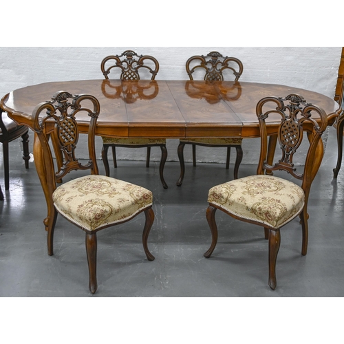 861 - A serpentine oak dining table with parquetry top and a set of four Edwardian rococo-revival walnut d... 