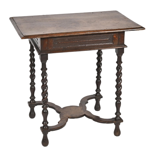 876 - An oak side table, 18th c, the later associated oversailing top on moulded frame and spiral legs, 70... 