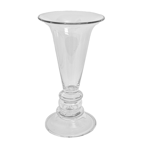 88 - A glass vase with a flared rim and bulbous stand, 46cm h