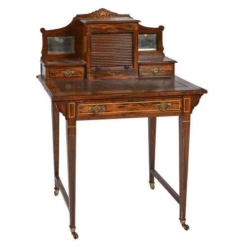 897 - An Edwardian rosewood and inlaid writing table, the superstructure with fitted interior enclosed by ... 