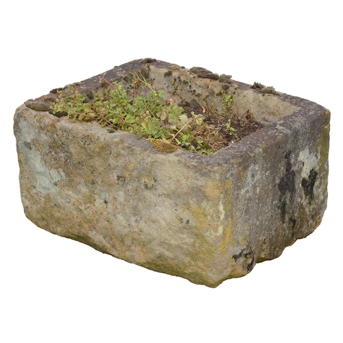 908 - Garden ornaments. A grit stone trough, 19th c, 30cm h; 48 x 56cm