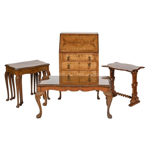 917 - A walnut bureau, coffee table, nest of tables and a small table