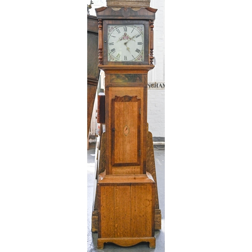 929 - A Victorian oak and mahogany inlaid longcase clock, the painted dial decorated with roses, 200cm h... 