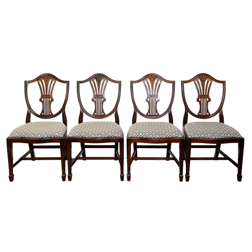 962 - A set of four mahogany shield-back dining chairs, late 20th c