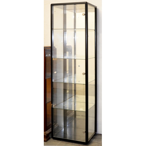 963 - A black ash and plate glass mirror backed cabinet, of recent manufacture, with plate glass shelves, ... 