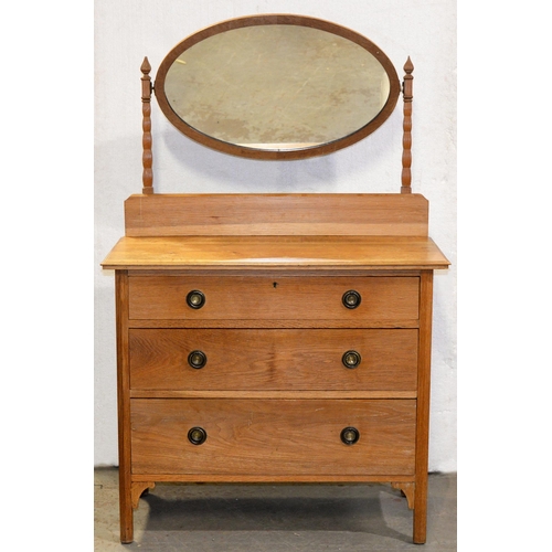 972 - An oak mirror-backed dressing table, c1930, 143cm h; 92 x 45cm