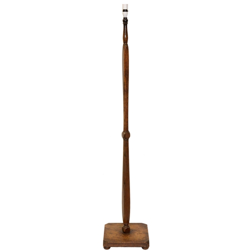 972A - An oak standard lamp, c1930, 150cm h excluding fitment