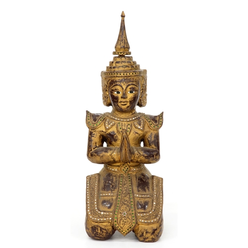 1004 - A carved and gilded hardwood sculpture of a bodhisattva, Thailand, 20th c, the elaborate costume wit... 