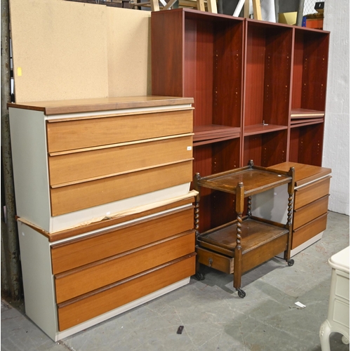 1007 - Bath cabinet Makers Ltd. A pair of teak and laminate chests of drawers,  and another, smaller, en su... 