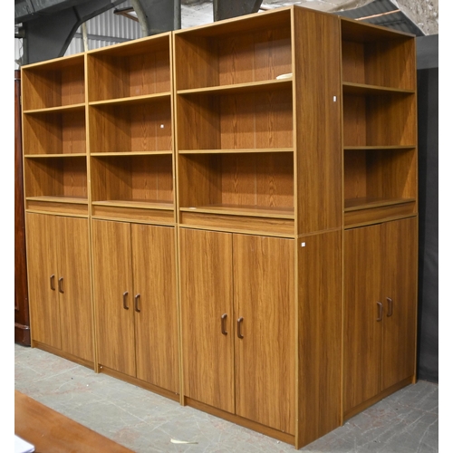 1008 - A set of four teak laminate bookcases,  205cm h, 80cm l