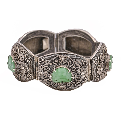 101 - A  silver filigree bracelet,   of five panels, each set with a jade carving of Budai, 16.5cm l, 42g,... 