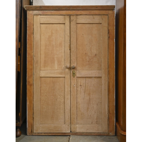 1010 - An Edwardian waxed pine cupboard, 151cm  h, 105cm l