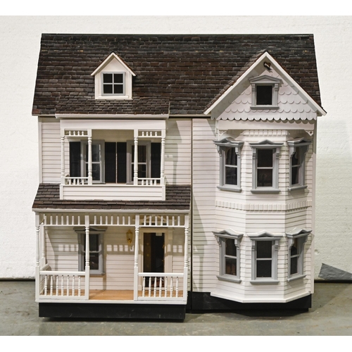 1045 - A Victorian style painted wood dolls house, ofsix rooms and attic storey, 84cm  h and a collection o... 