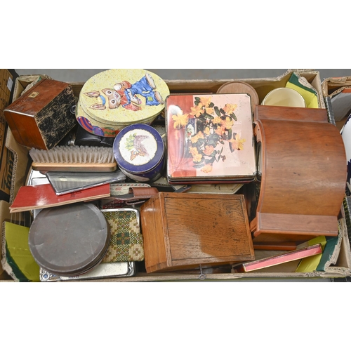 1051 - An oak  games box,  aneroid barometer, decorative tins, reproduction mantle clock, etc... 