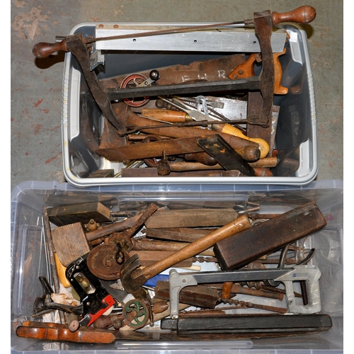 1073 - A collection of woodworking tools,  early 20th c and later, to include a square, several saws, screw... 