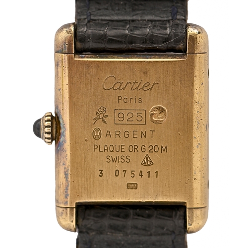 120 - A Le Must de Cartier silver gilt Tank lady's wristwatch, quartz movement, 21 x 28mm, maker's and con... 