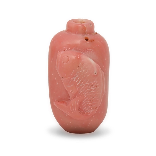 194 - A Chinese coral snuff bottle, carved with carp, 44mm h, 35g