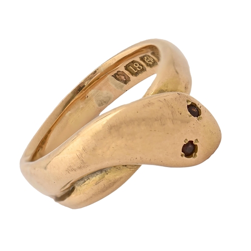 20 - An Edwardian 18ct gold serpent ring, with garnet eyes, Birmingham 1905, 11.5g, size O... 