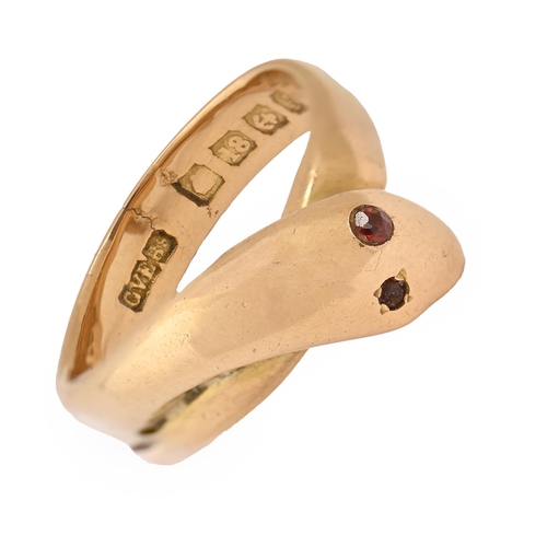 24 - An Edwardian 18ct gold serpent ring, with garnet eyes, Birmingham 1905, 11.6g