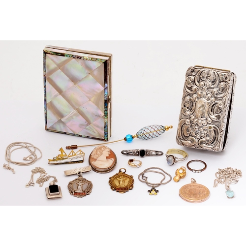 266 - A Victorian mother-of-pearl card case, two silver watch fob shields, one gilt, a cameo brooch in sil... 