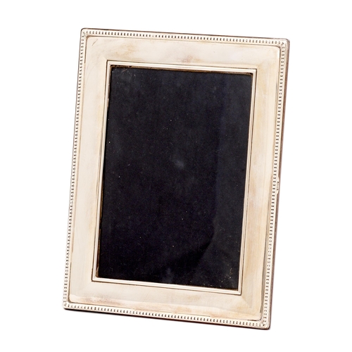 269 - An Elizabeth II silver photograph frame, 17.5cm x 22cm, by Carrs of Sheffield Ltd, 1997... 