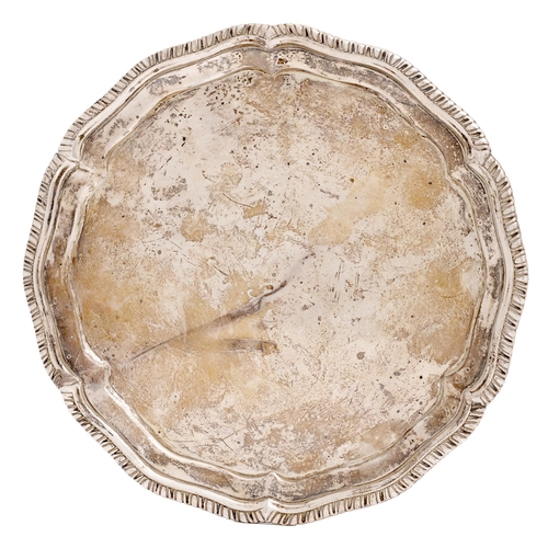 281 - An Irish George II silver salver, with gadrooned rim, on fluted feet, 20.5cm diam, marks rubbed, Dub... 