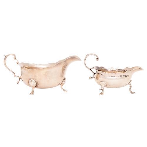 284 - A George II silver sauceboat, 12.5cm l, marks rubbed, London 1754 and a larger silver sauceboat, Che... 