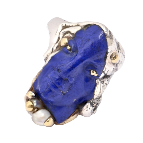 3 - David Hensel (1945-) A carved lapis lazuli, baroque pearl, gold and silver face ring, signed H, 20g,... 