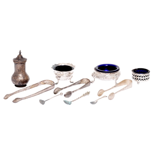 310 - Three silver salt cellars, each with blue glass liner, the Victorian three-footed example 68mm diam,... 